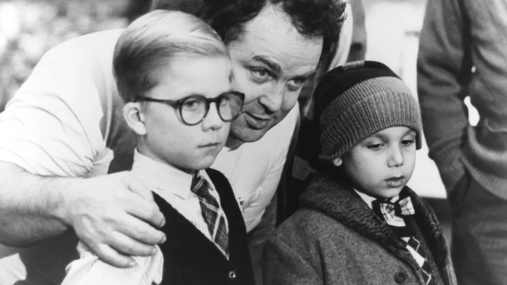Picture of Director Bob Clark working with his star, Peter Billingsley on the set of A Christmas Story in 1943